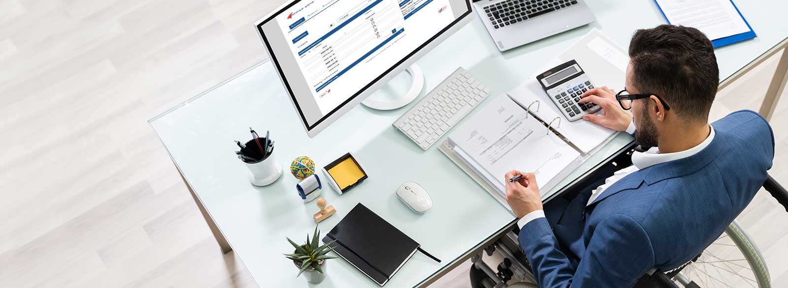 top view of a business man reviewing statements online