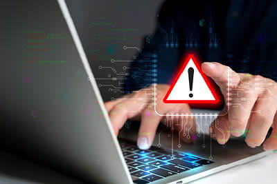 hand typing on computer