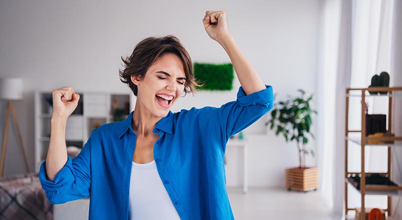 person dancing and smiling