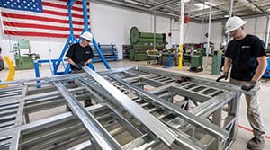 Mark III employees in warehouse