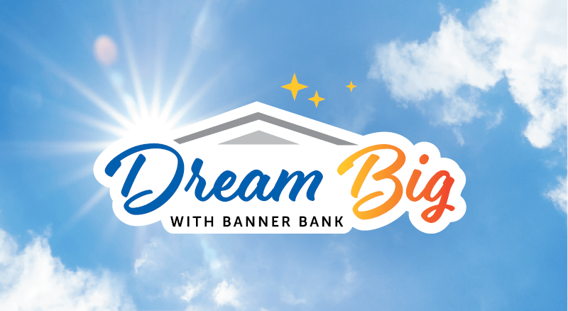 Dream Big with Banner Bank logo on blue sky with clouds
