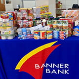 Canned and packaged food on donations table