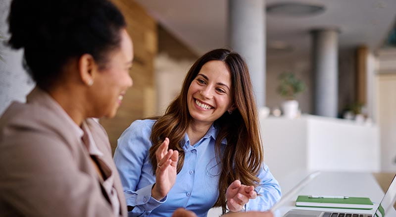 Two people in discussion in an office