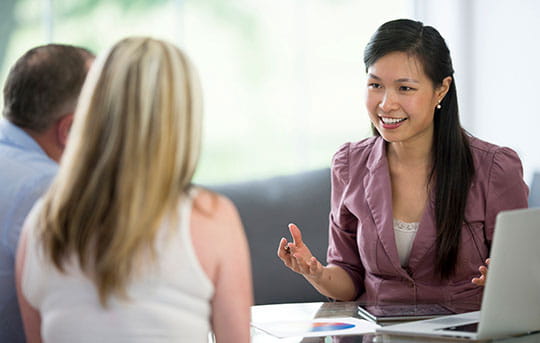 Banker meets with new clients