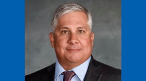 Photo of Tony Becerril on a blue background