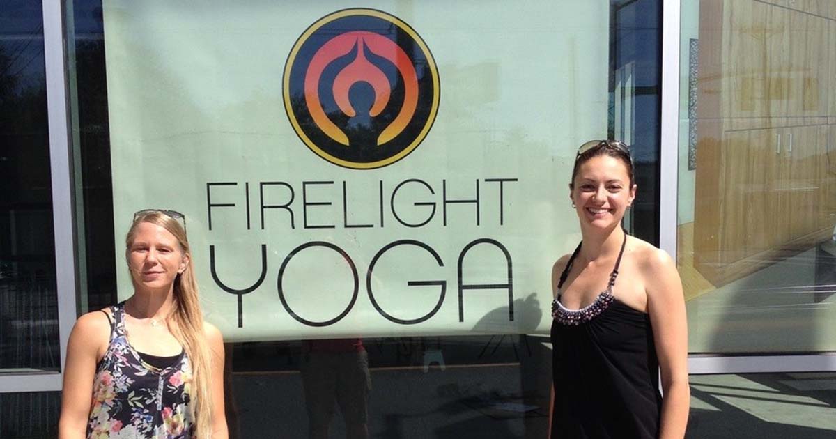 Firelight yoga owners in front of studio