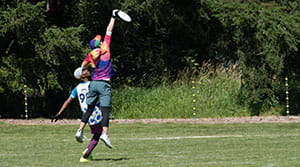 two people playing ultimate frisbee