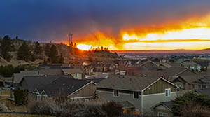Bright sky above homes in a Spokane neighborhood