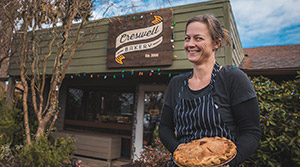 Heidi with a pie outside Creswell Bakery