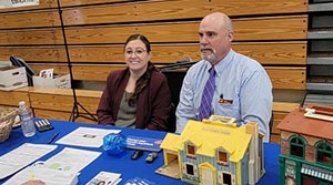 Two people sitting at a table