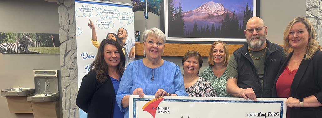 Dream big monthly winner check presentation