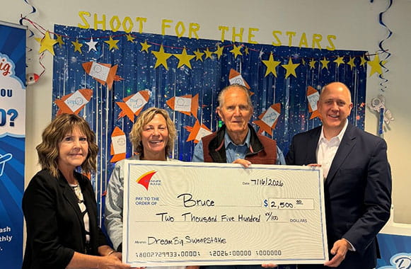 Dream Big $2,500 check presentation to Bruce