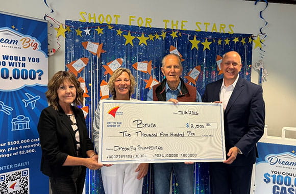 Dream big monthly winner check presentation