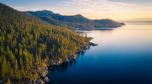 Landscape of mountains, trees and a lake