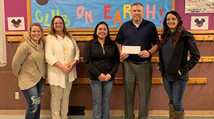 Members of our Lewiston, Idaho, team deliver a $5,000 contribution check to their local Boys & Girls Club.
