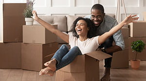 New homeowners celebrate with moving boxes