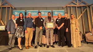 Seven Banner Employees Accepting an award