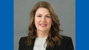 Photo of Jennifer Krug on blue background