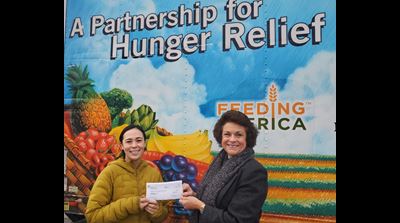 Presentation of Check Donation at Event