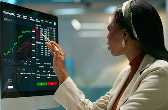 Person on computer in office looking at numbers