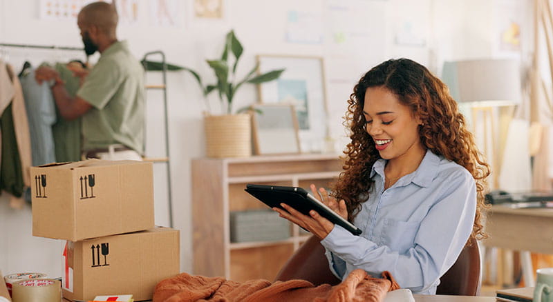 Person looking at tablet in home office