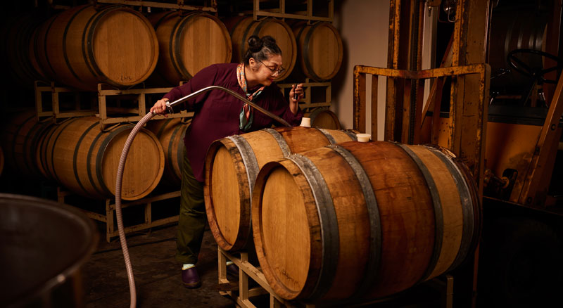Vintner opens oak wine cask