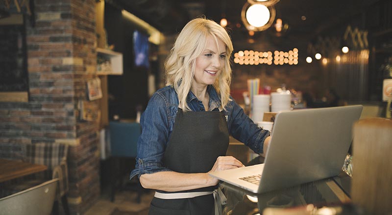 Small business owner on laptop