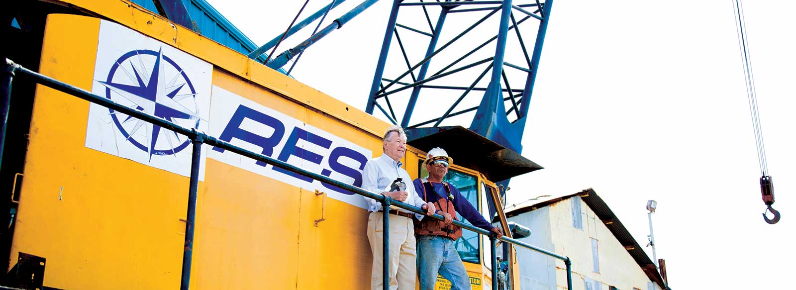 Business owner and foreman at worksite
