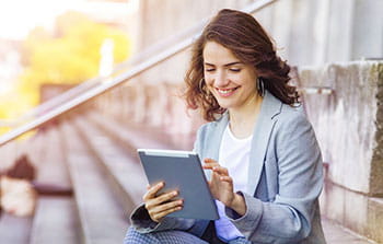 Person using business online banking on tablet