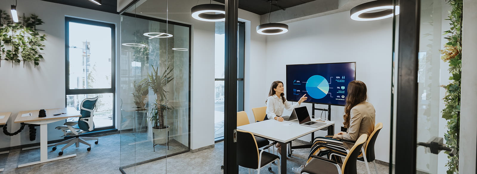 Colleagues discussion presentation in office space