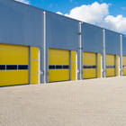 Warehouse garage bays with yellow doors financed with an income property permanent loan from Banner Bank