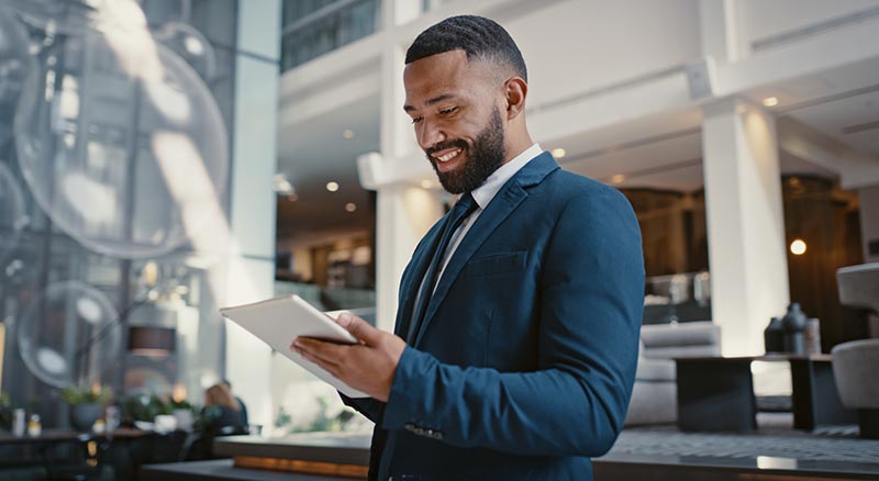 Person looking at tablet in an office building