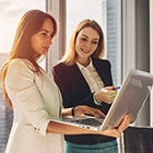 two women on a computer