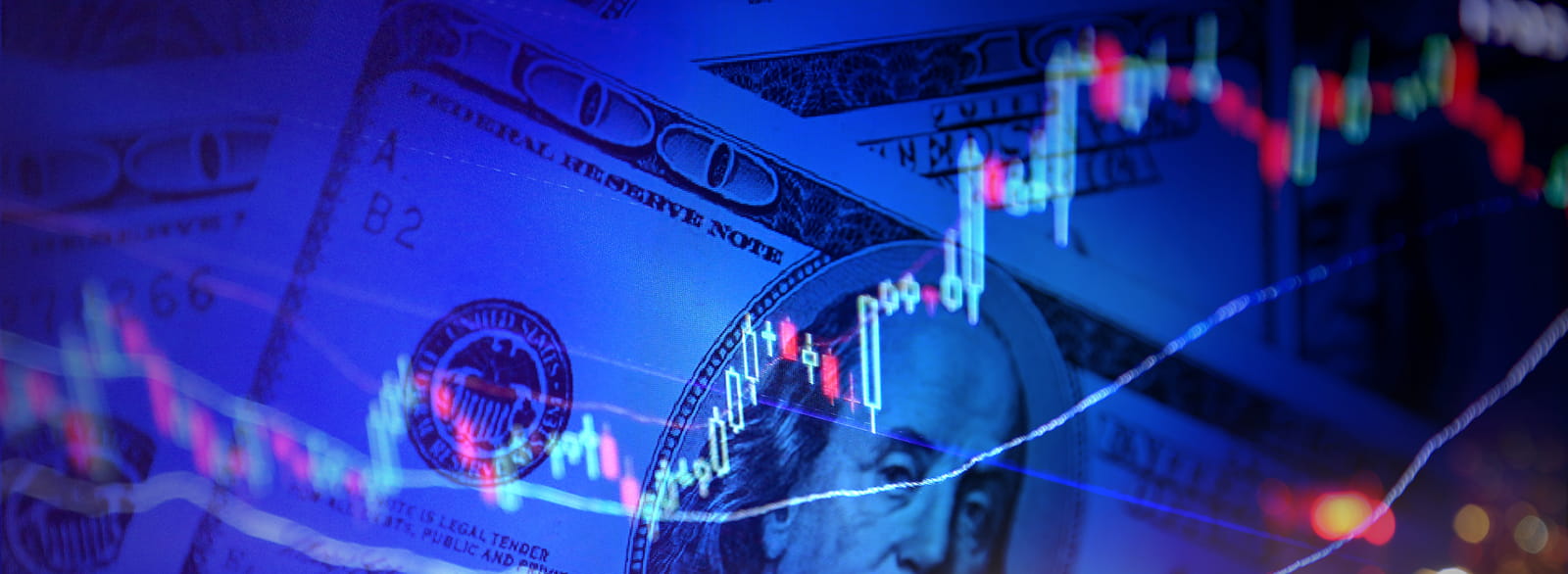 Line chart across the whole frame with $100 bills in the background