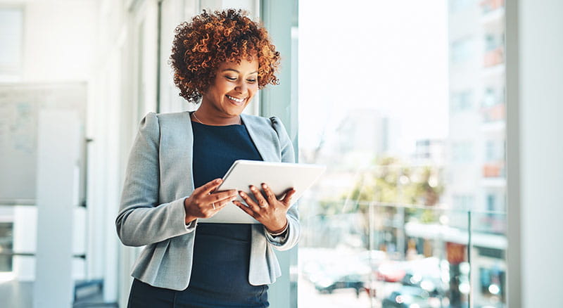 Person in office using a tablet