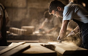 Woodworker working in shop