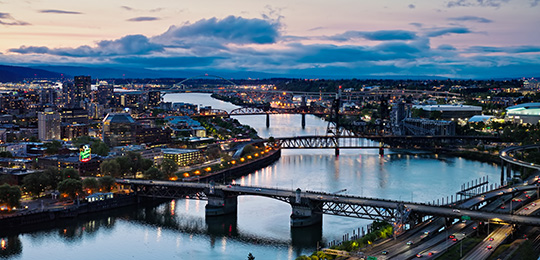 Portland, Oregon skyline and bridges at sunset