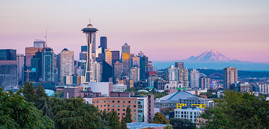 Seattle skyline and mountain at sunset
