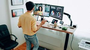 Person talking through computer and working from home office