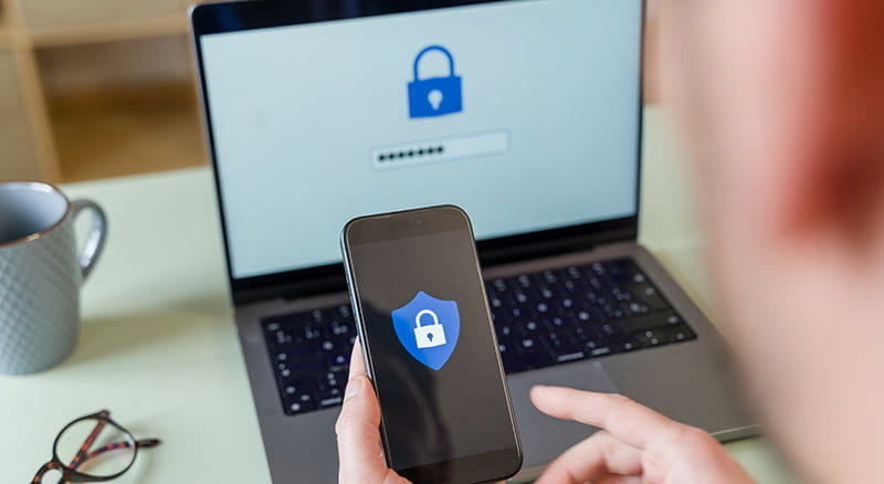 Secure icon on phone and laptop
