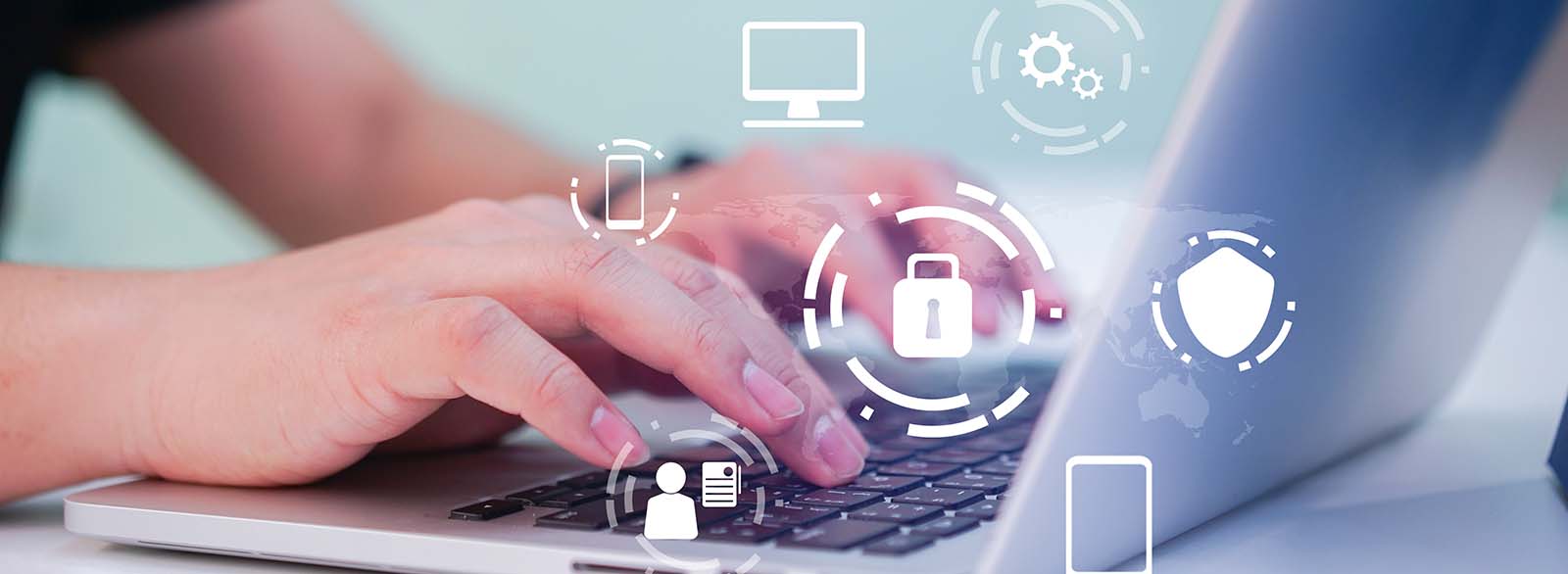 Person using laptop with secure icons