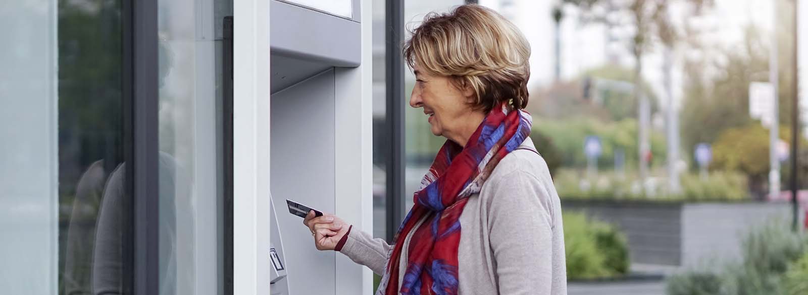 Person using ATM