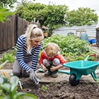 Mother and son gardening