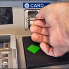 Man inserts card into an ADA accessible ATM at Banner Bank