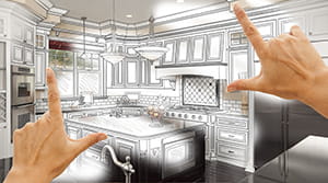 Two hands held out with index finger and thumbs extended at 90 degree angles framing an artist concept of a kitchen remodel