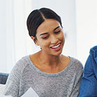 A woman reviews her new account paperwork