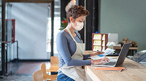 Business owner assessing business plan