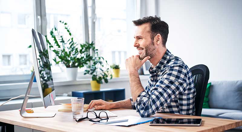 Person looking at Banner online banking on computer