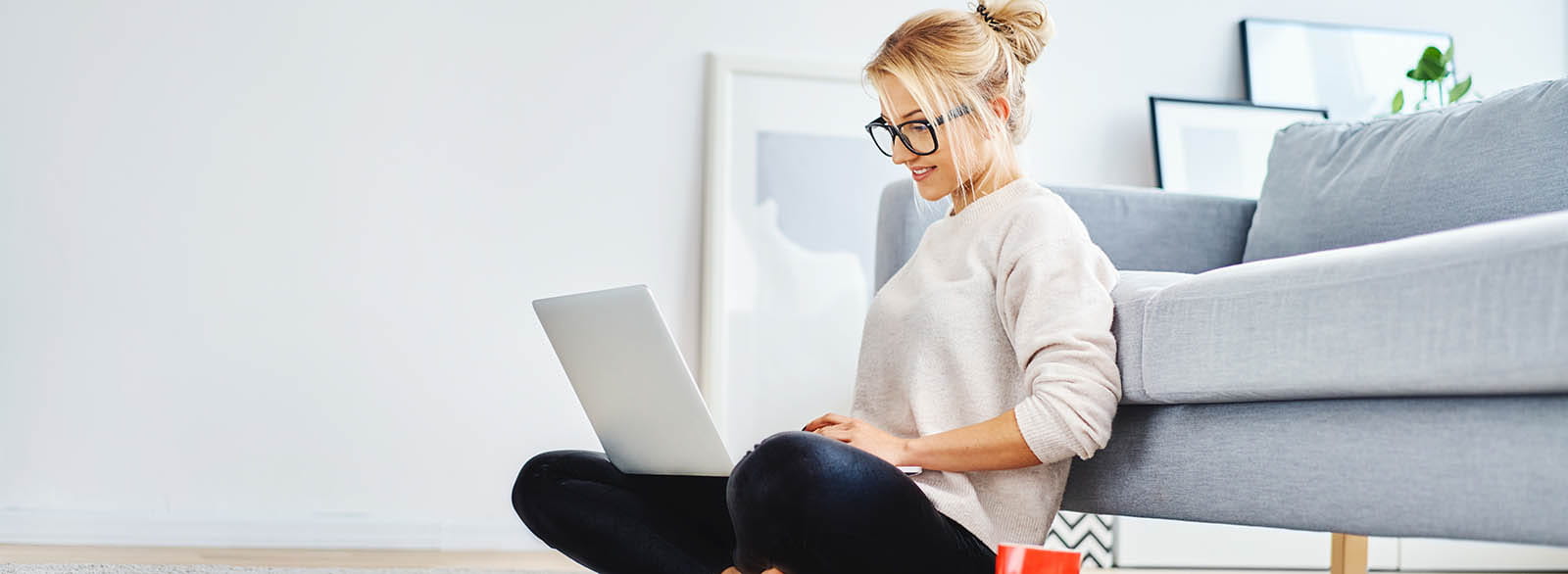 Person banking online using laptop