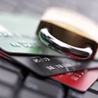 Lock sitting on top of credit cards